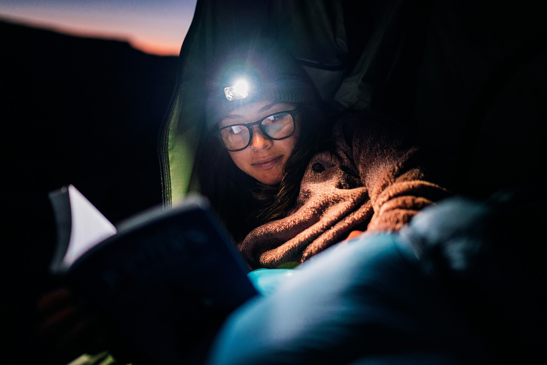 Person reading wearing Rory prescription eyeglasses