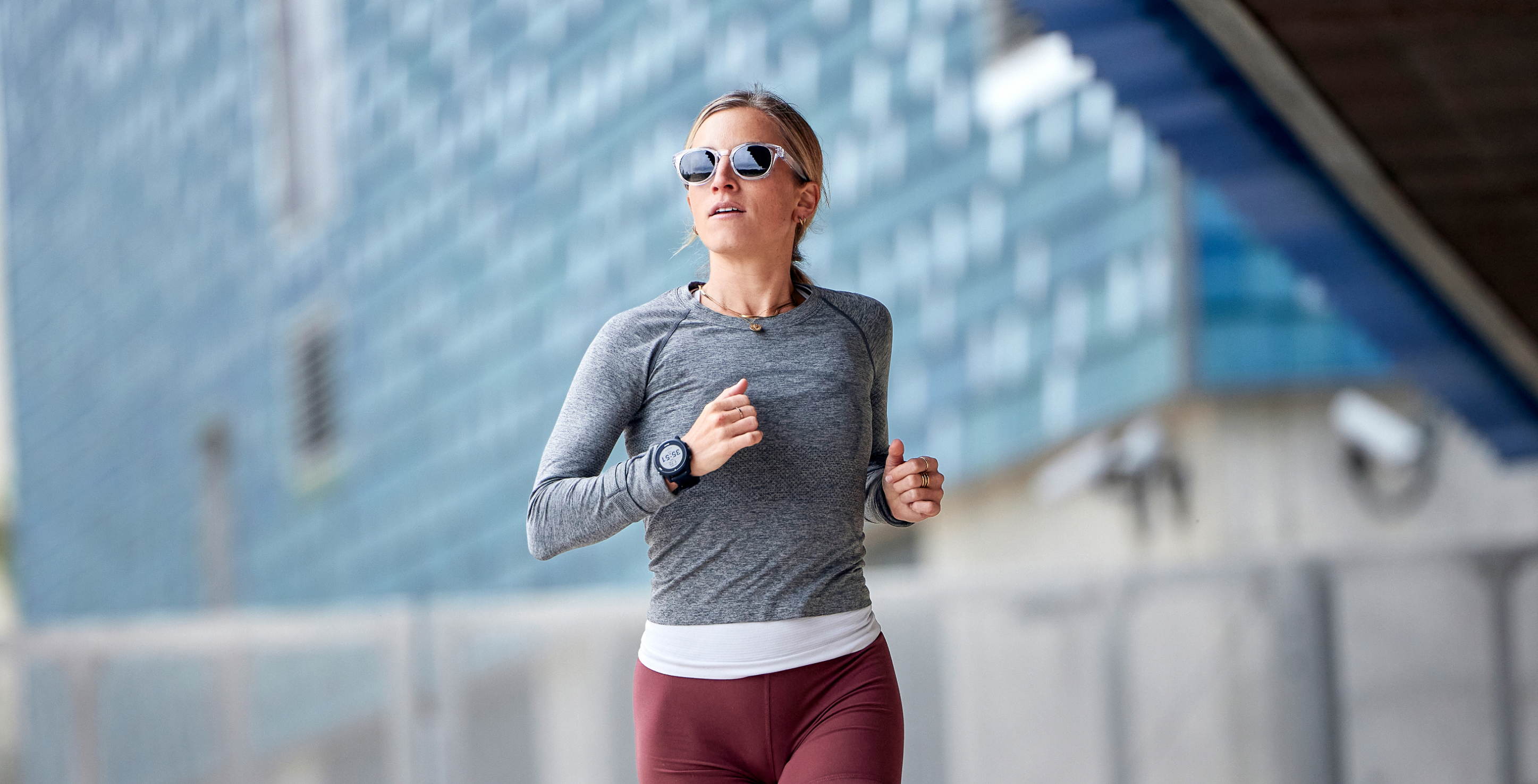 Woman jogging in grey top