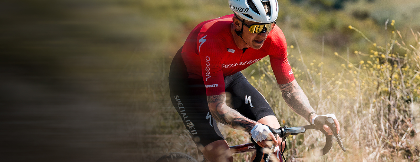 Man cycling in red top and San Remo AIR sunglasses