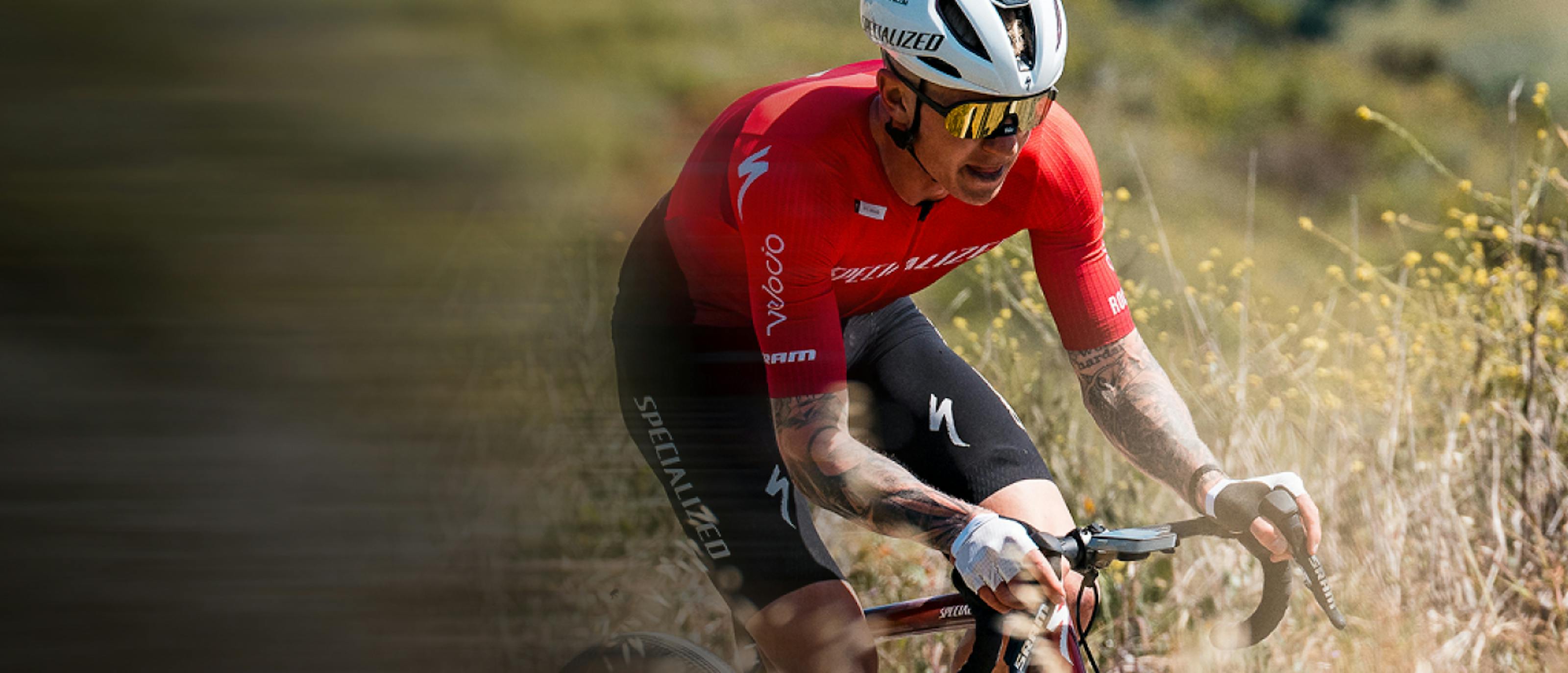 Man cycling in red top and San Remo AIR sunglasses