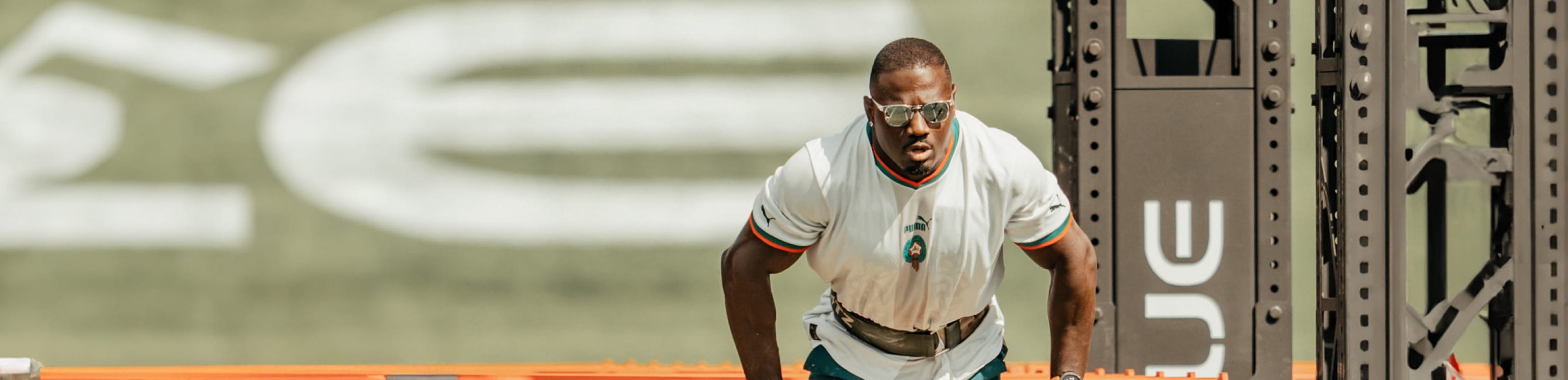 Male working out in sunglasses