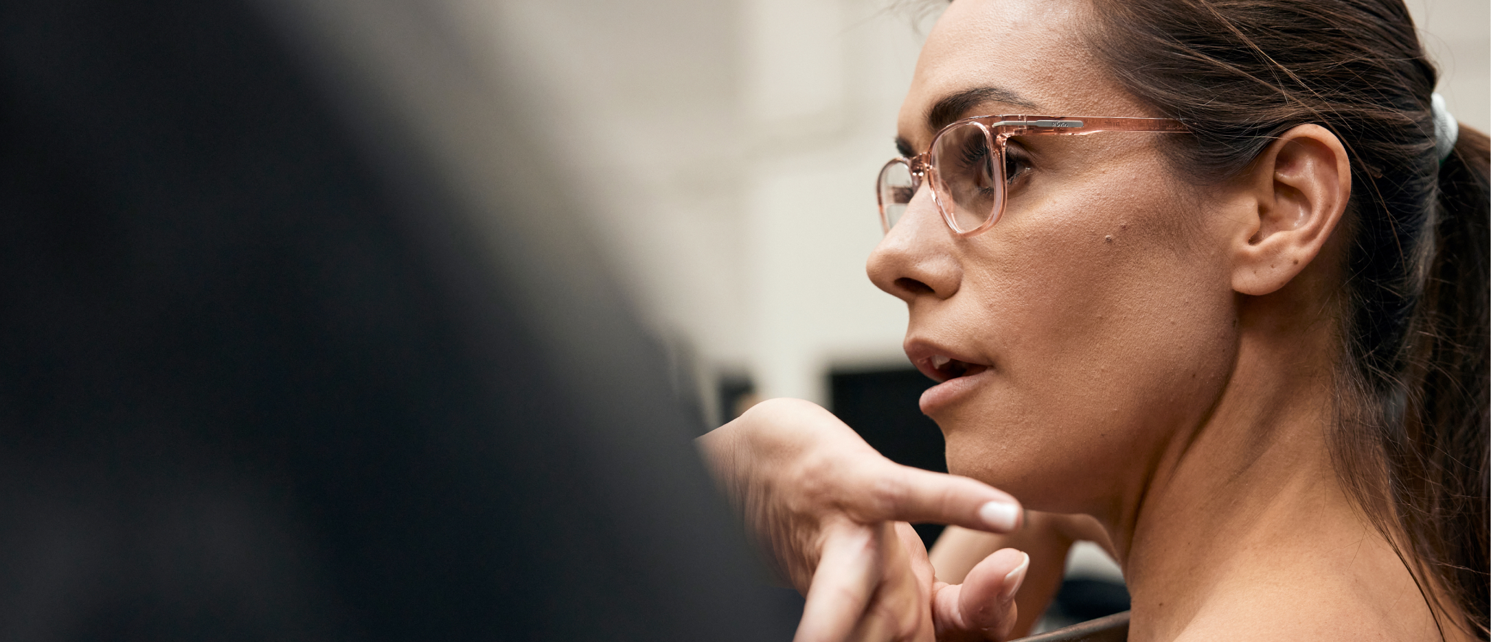 Woman weightlifting wearing rectangular, bourbon Cade eyeglasses