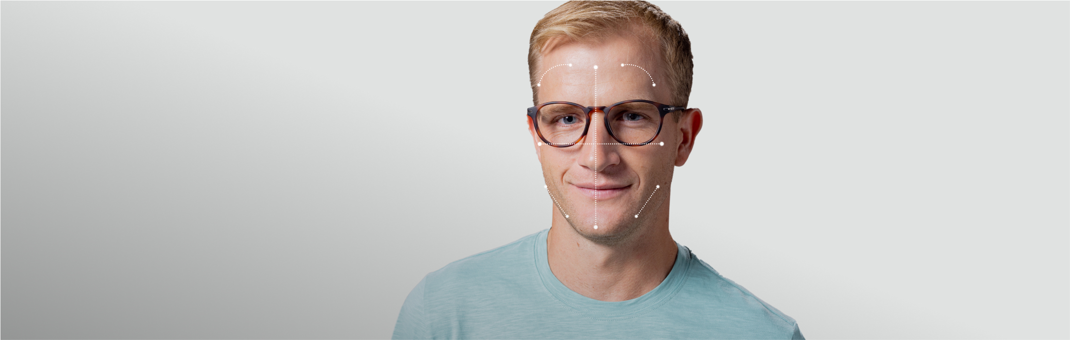 Man in teal shirt wearing Oslo eyeglasses