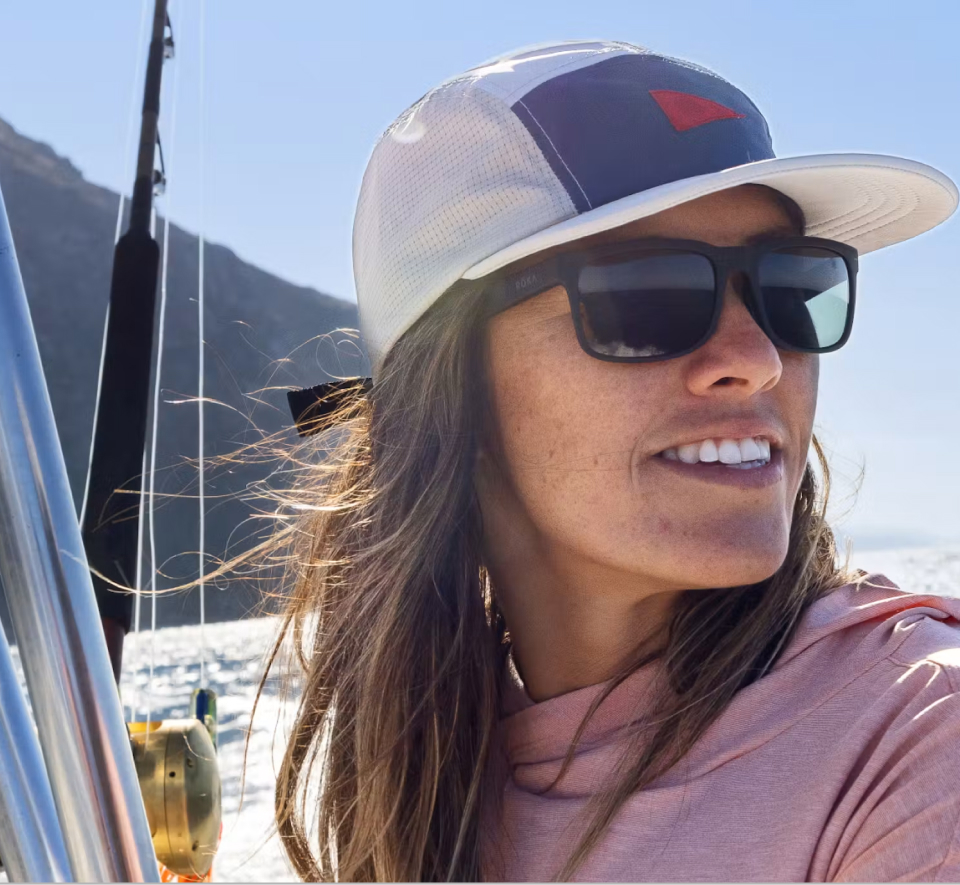 Woman wearing black ROKA sunglasses