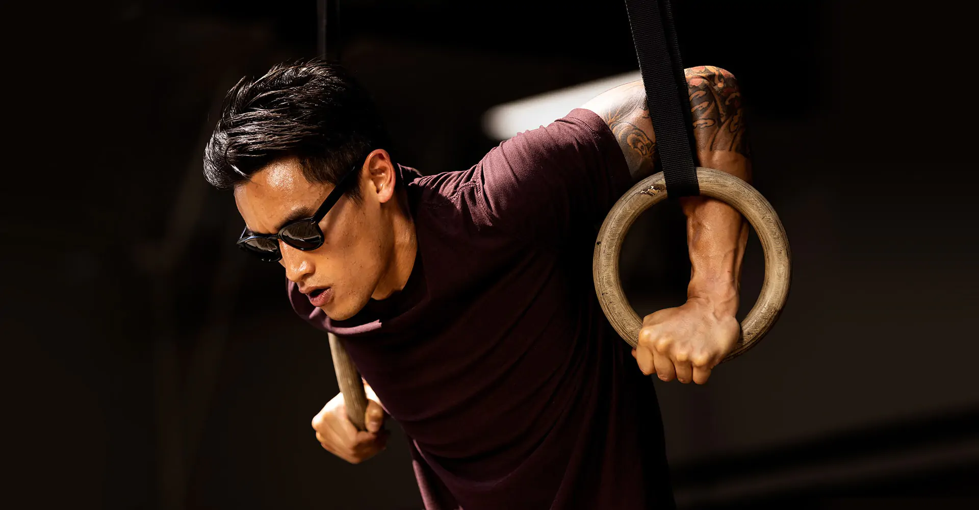 Man working out wearing Hamilton sunglasses 