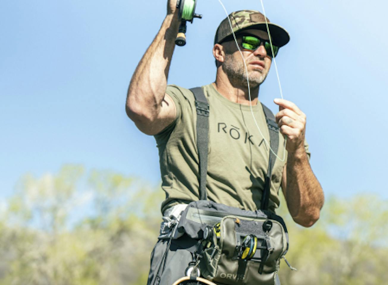 Man reeling in fishing line