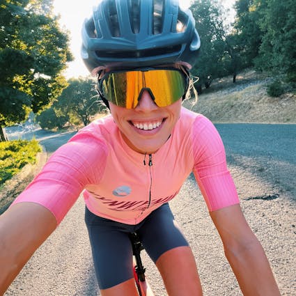 Colleen wearing Matador AIR Sunglasses and a bicycle helmet
