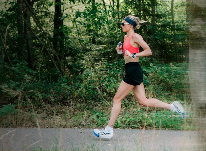 Woman jogging in pink top and San Remo AIR sunglasses