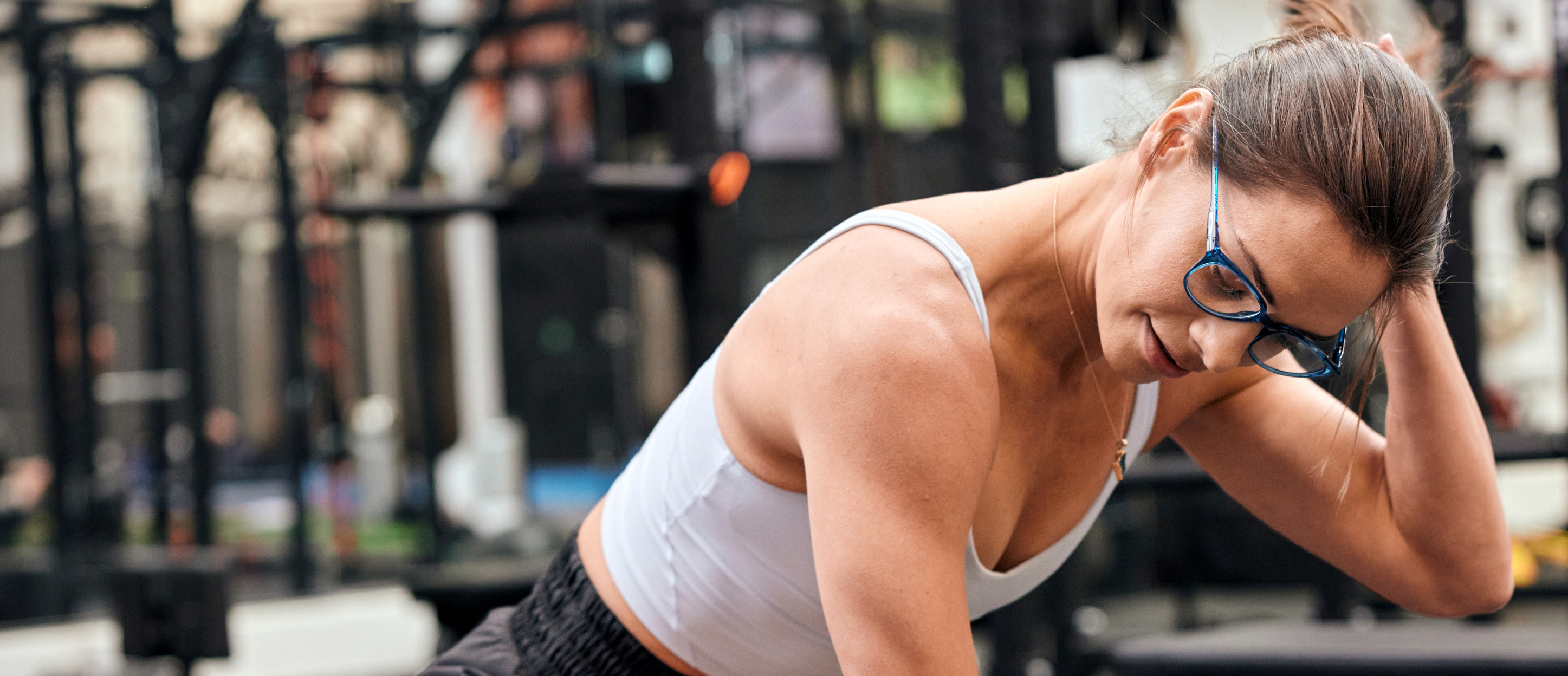 Woman exercising wearing cat eye shape, crystal blue Lola eyeglasses