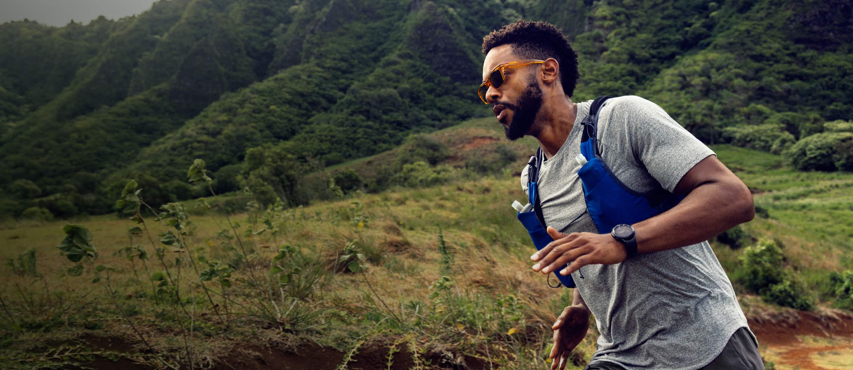 Man running outside wearing Lockhart sunglasses