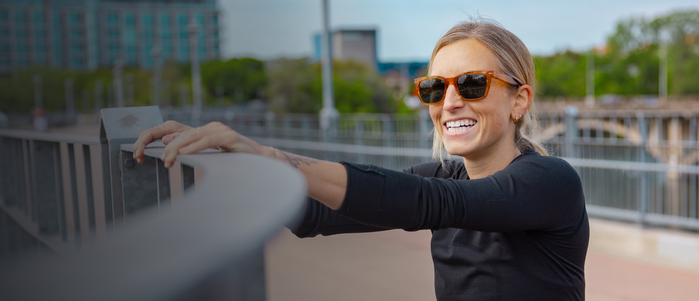 Woman smiling wearing Lockhart sunglasses