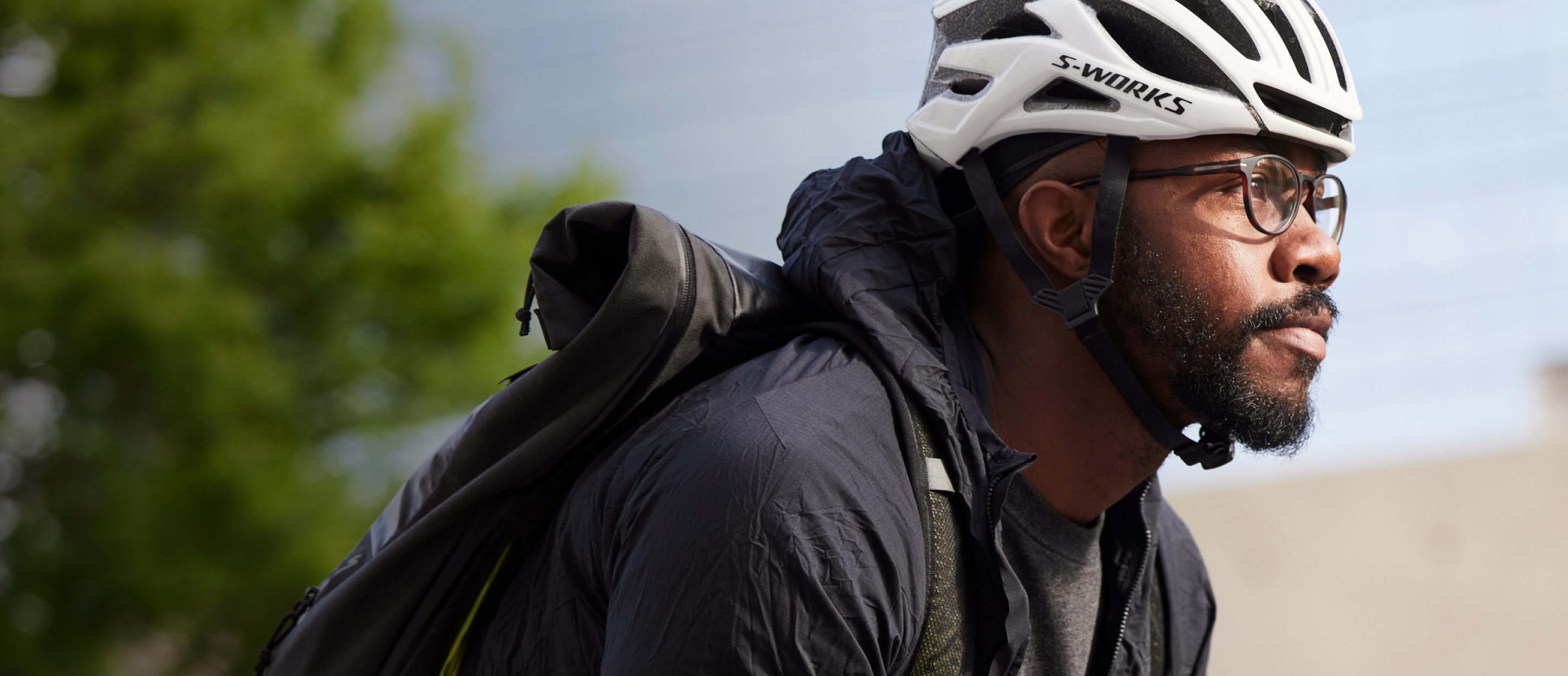 Man cycling wearing Oslo eyeglasses