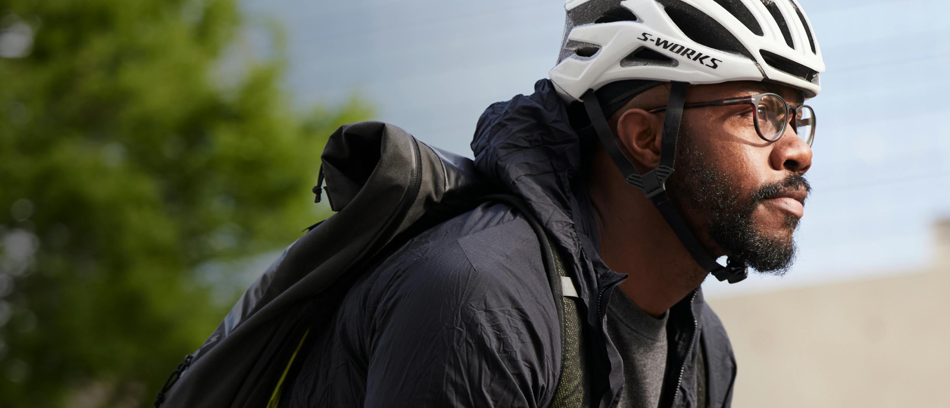 Man cycling wearing Oslo eyeglasses