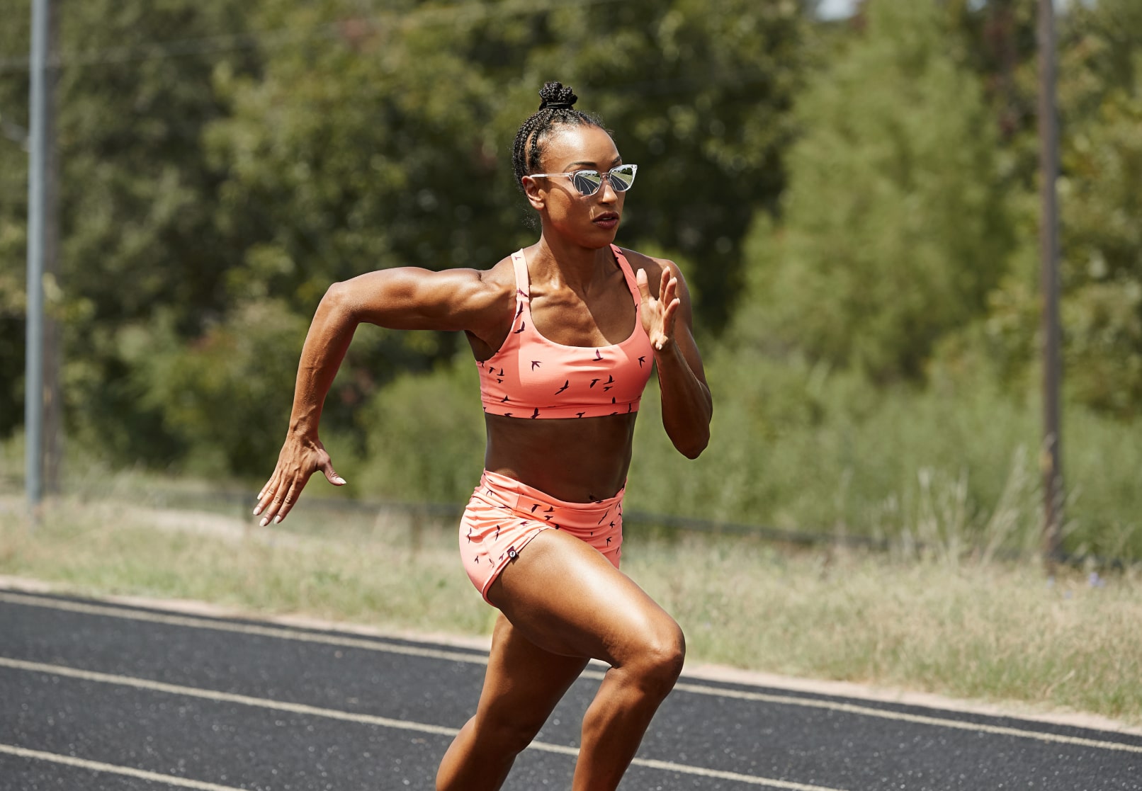 Woman running wearing Lola sunglasses