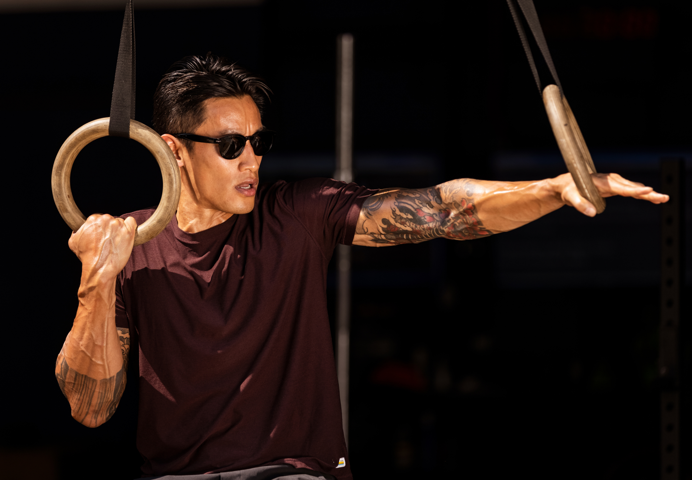 Man holding pull up rings