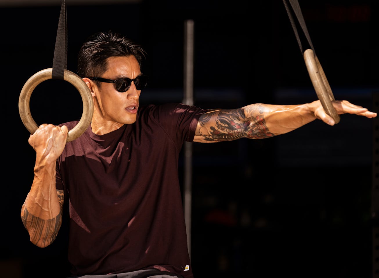 Man holding pull up rings