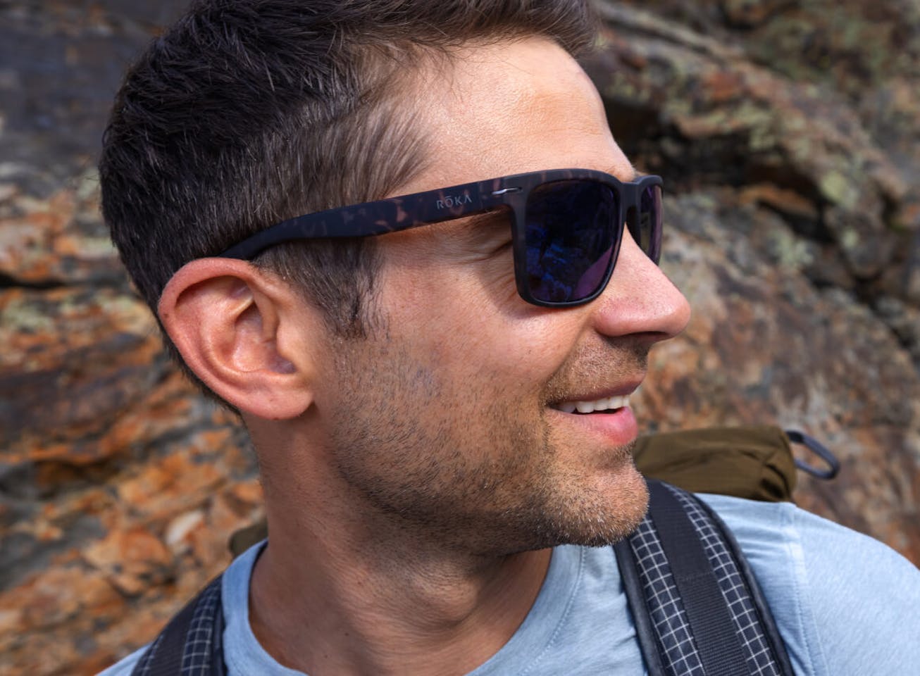 Man hiking wearing Barton sunglasses