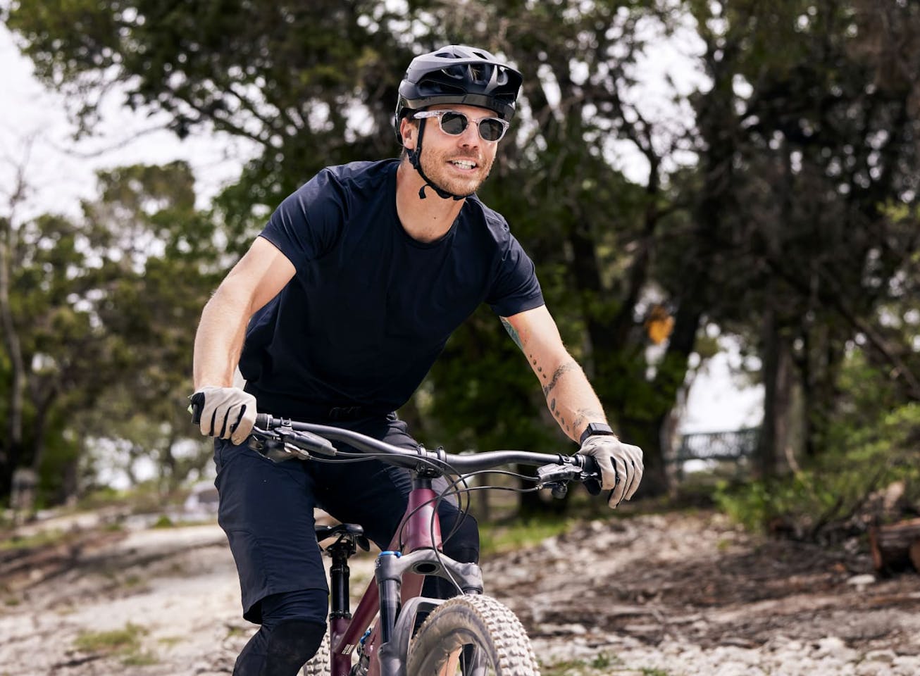Man cycling wearing Hamilton sunglasses