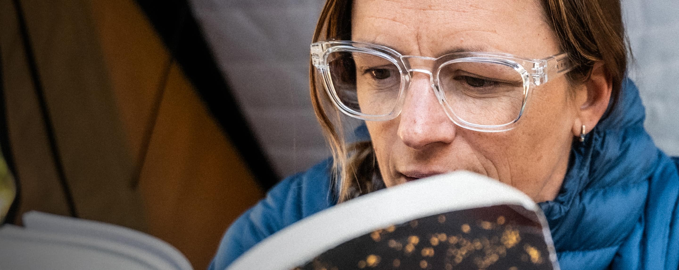 Woman reading in Jackson eyeglasses