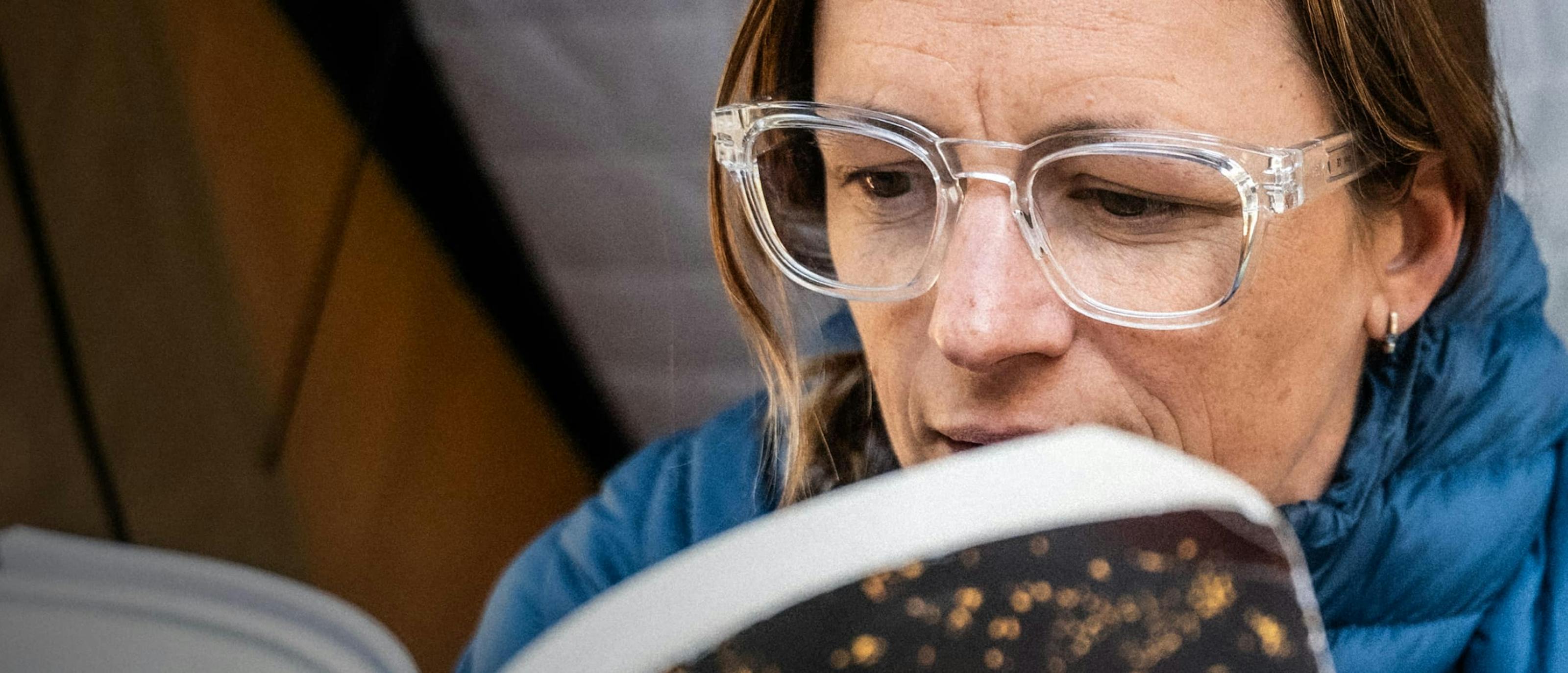 Woman reading in Jackson eyeglasses