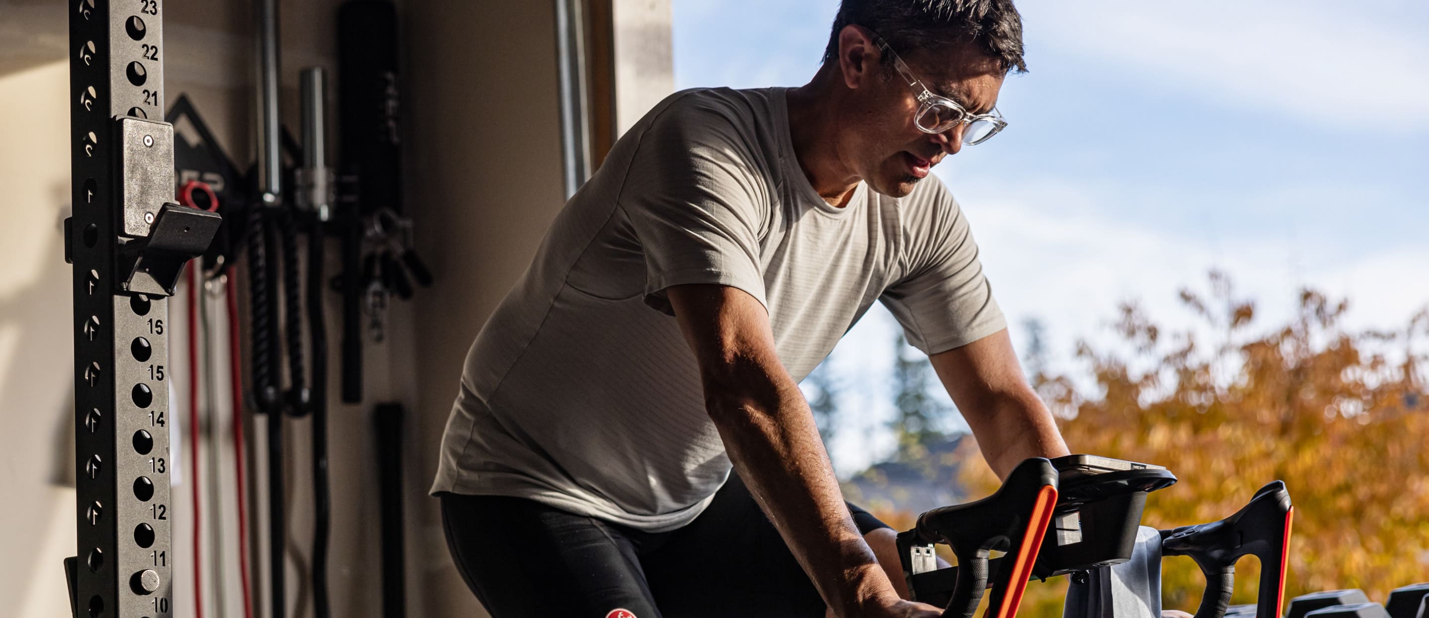 Man on stationary bike wearing Jackson eyeglasses