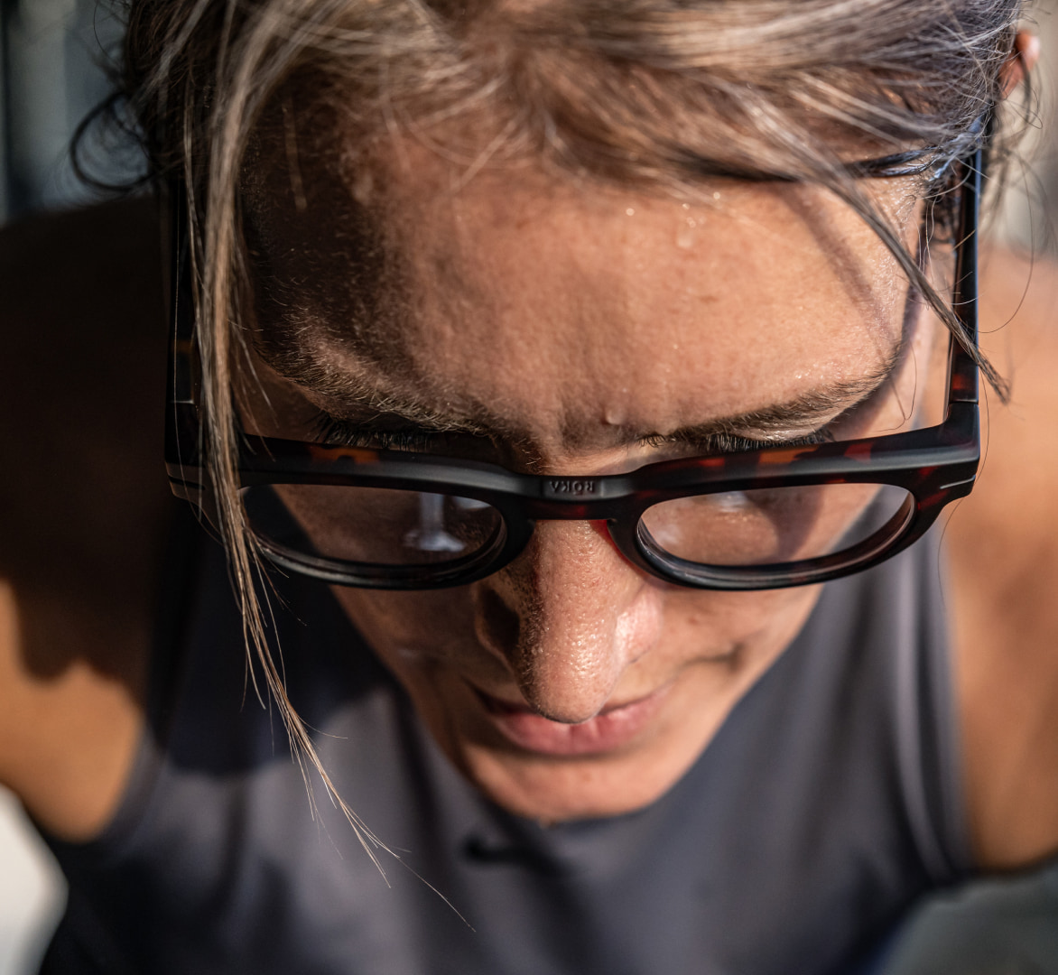 Woman looking down in Jackson eyeglasses