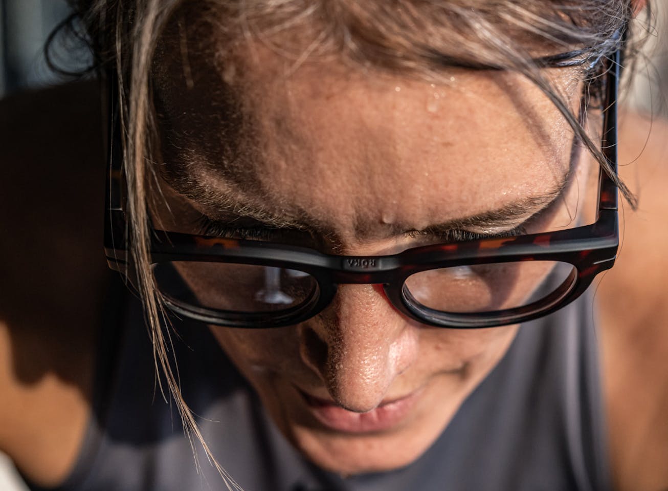 Woman looking down in Jackson eyeglasses