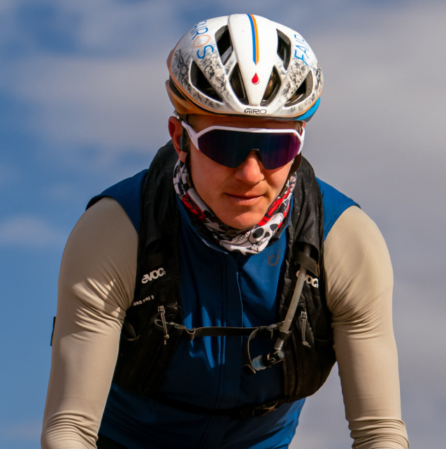 Man cycling with ROKA Sunglasses
