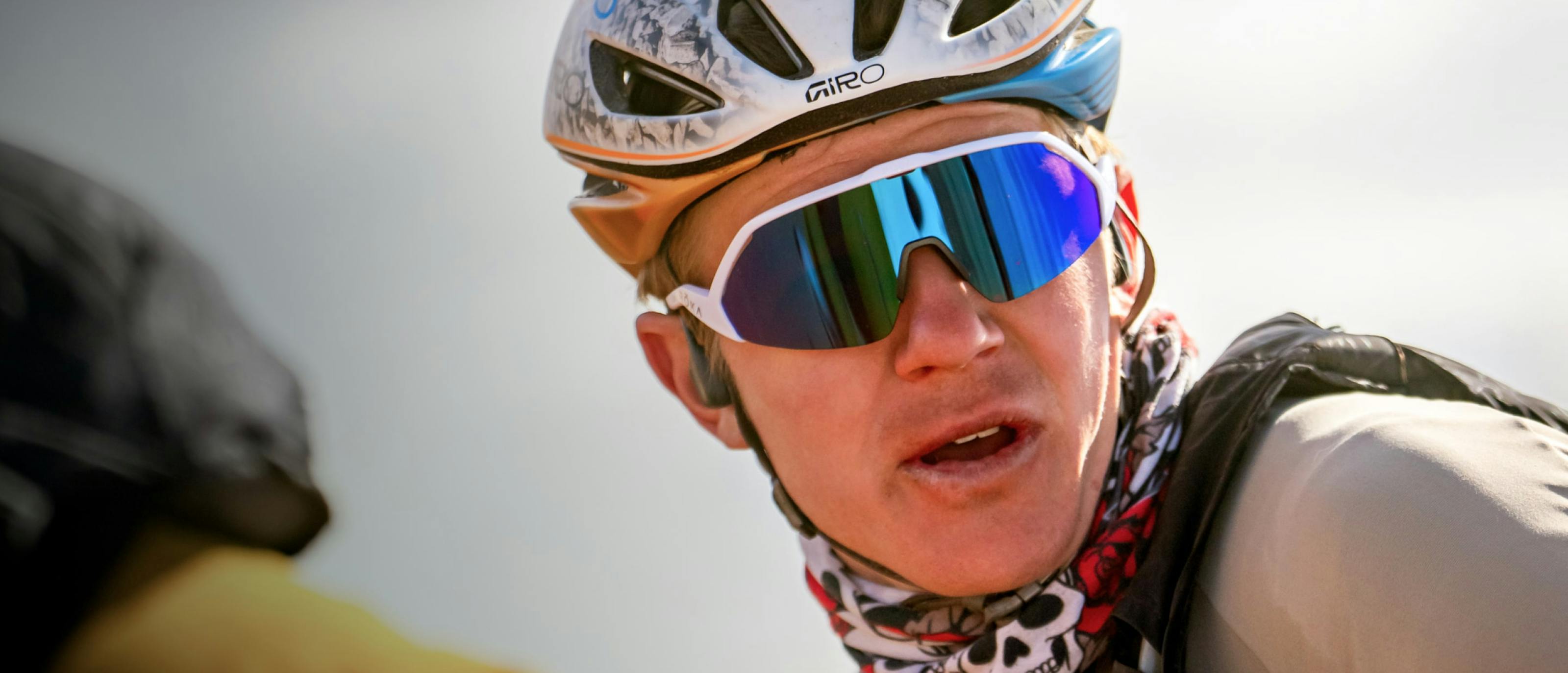 Man in cycling helmet and Matador AIR sunglasses