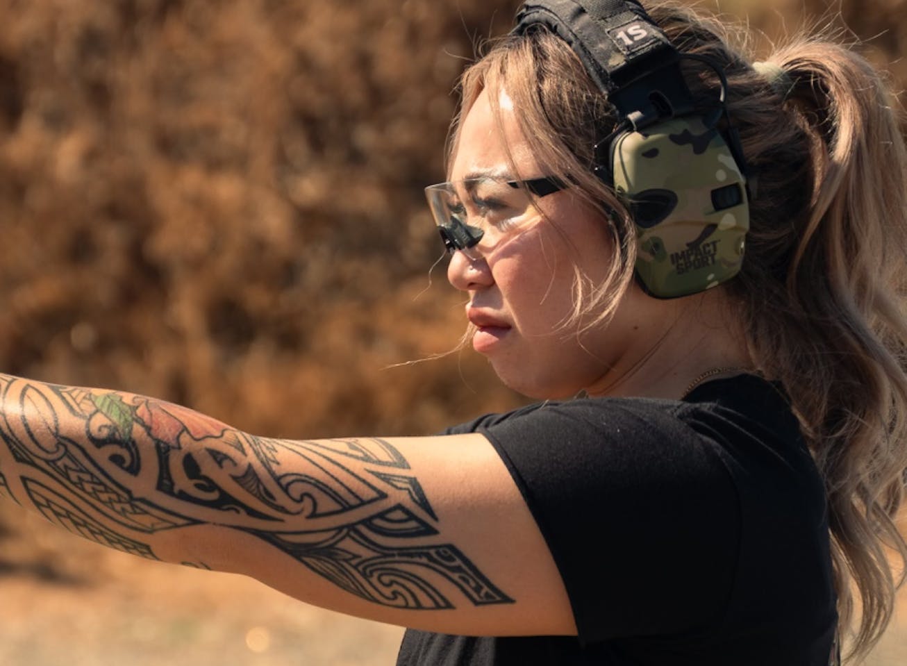 Woman at range in sl-1xt sunglasses
