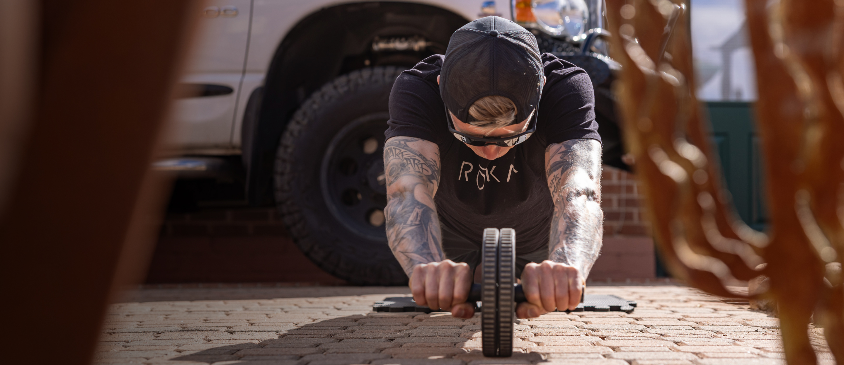 Man working out wearing ROKA sunglasses