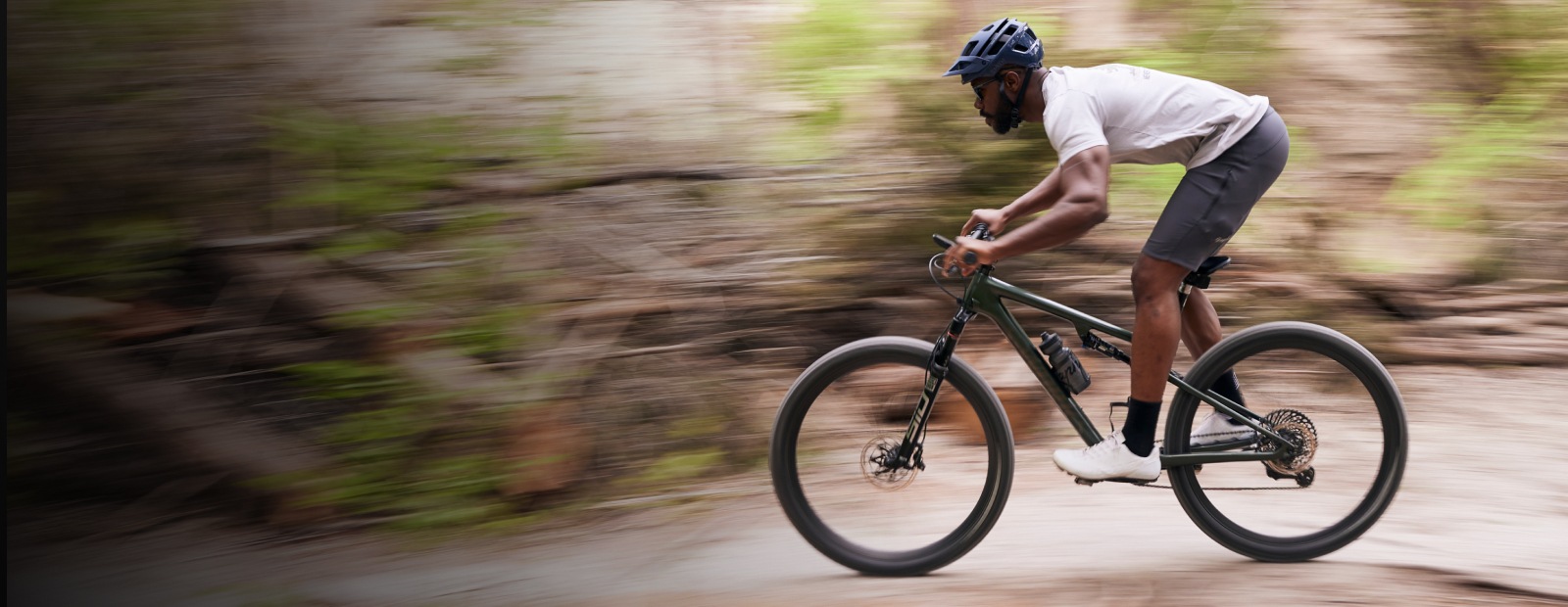 Man on mountain bike in the woods