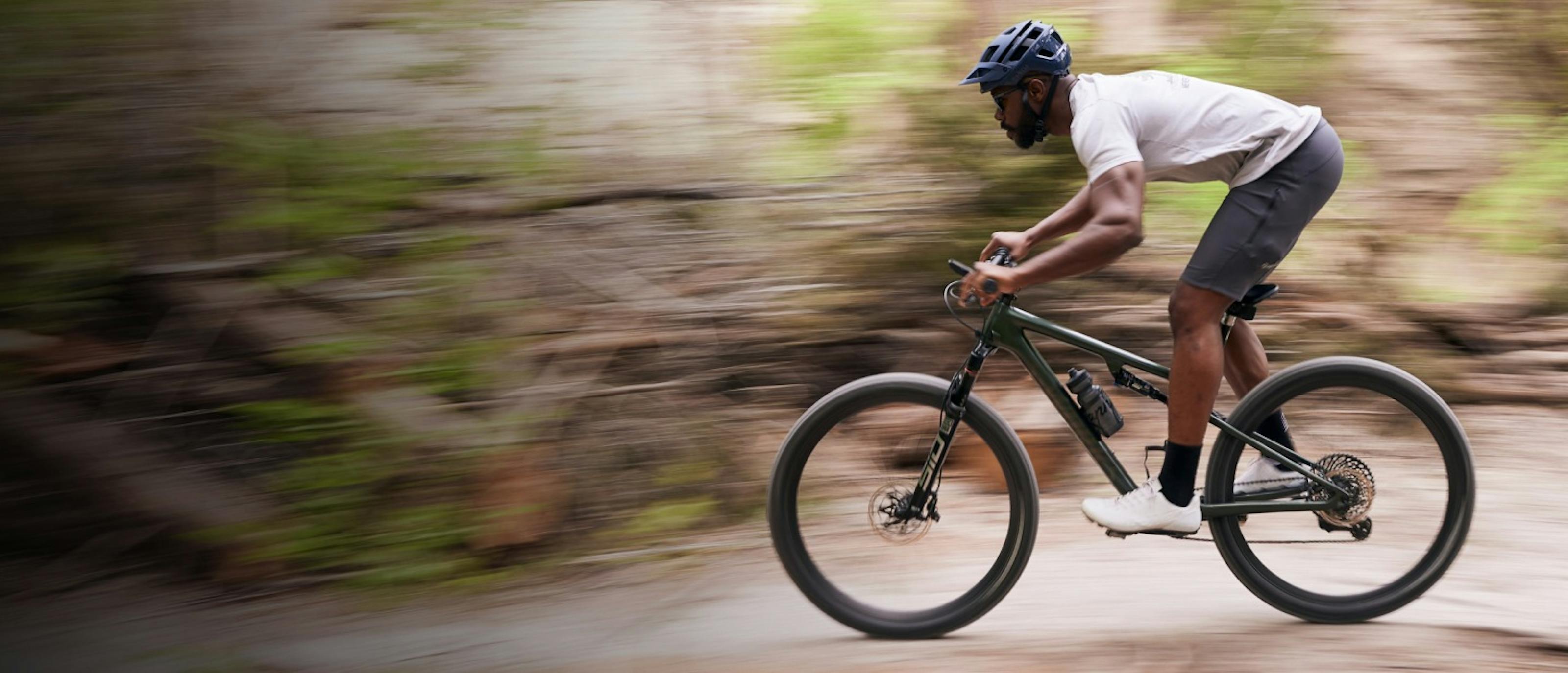 Man on mountain bike in the woods