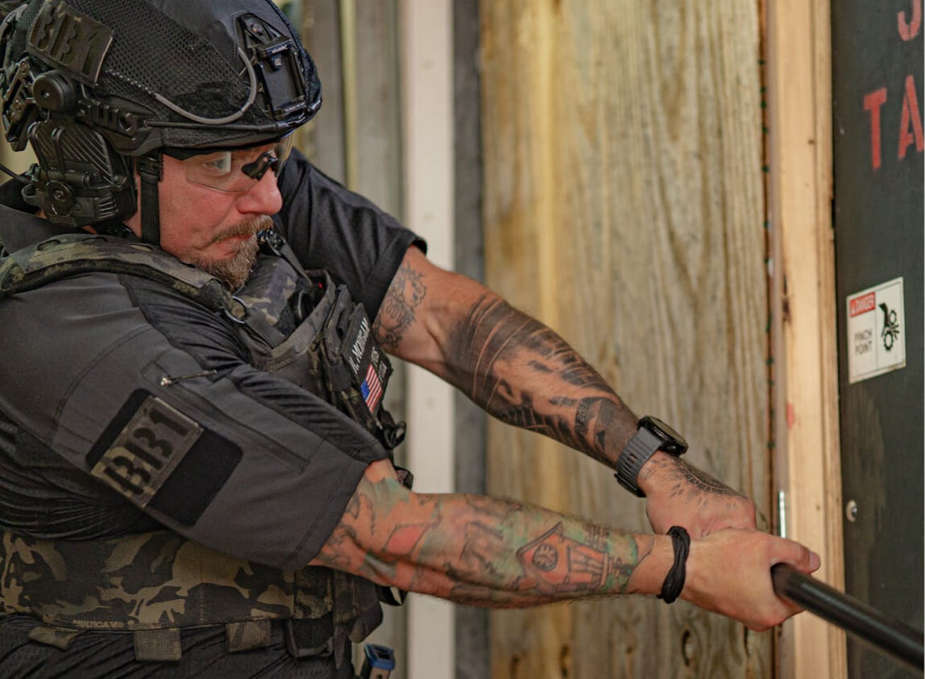 Man swinging hammer in SP-1EP Sunglasses
