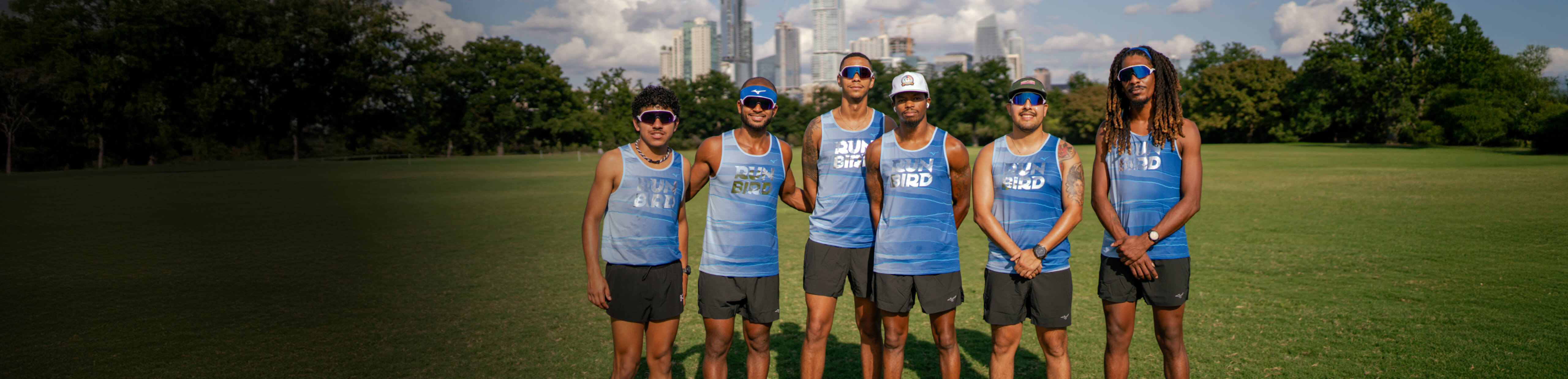 Runners posing outside wearing ROKA sunglasses