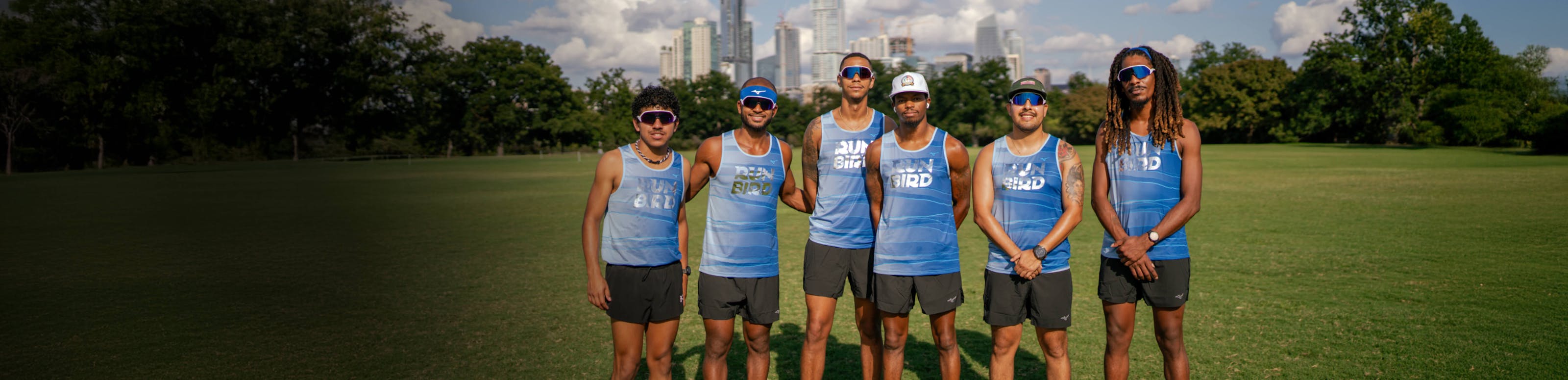Runners posing outside wearing ROKA sunglasses