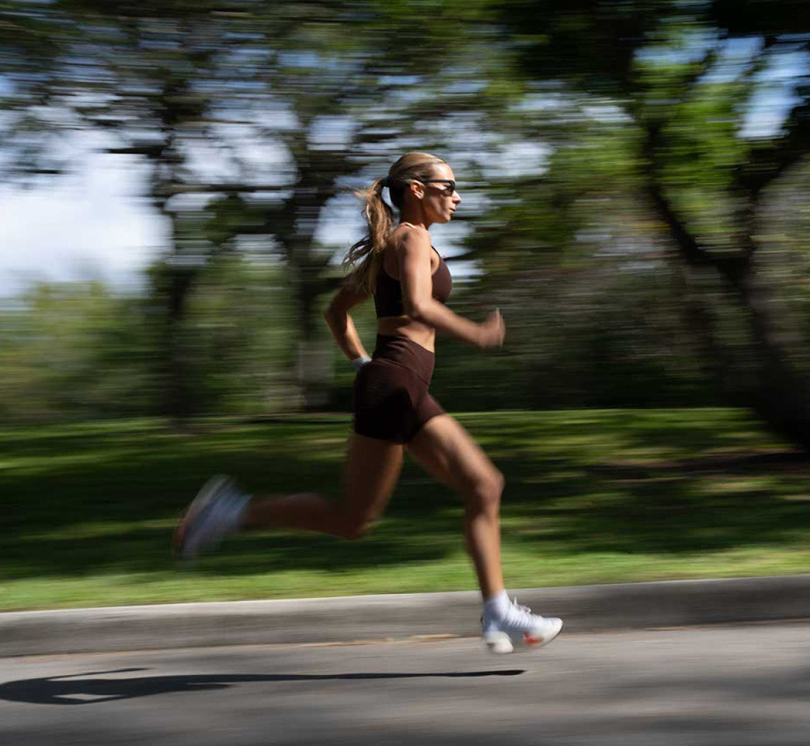 Woman running wearing Bandera sunglasses 
