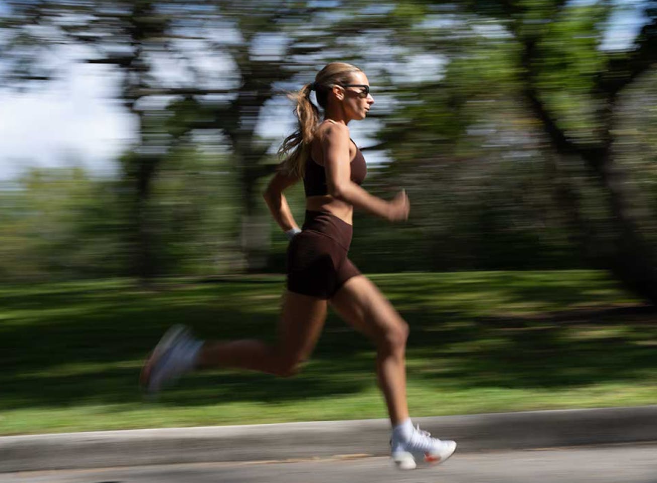Woman running wearing Bandera sunglasses