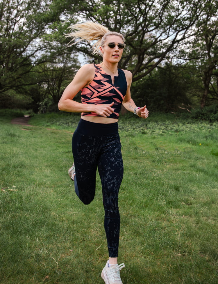 Woman running outside wearing Siena sunglasses