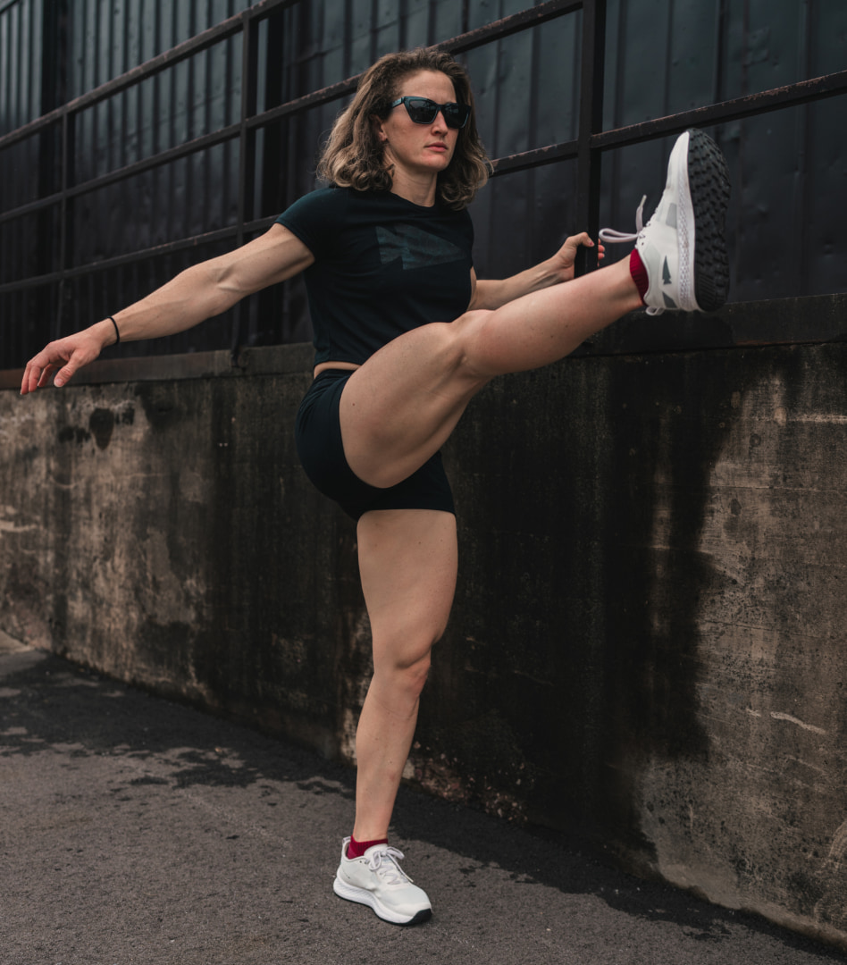 Woman stretching wearing Marfa sunglasses