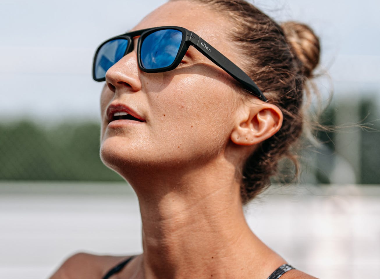 Woman looking up wearing Estacado sunglasses