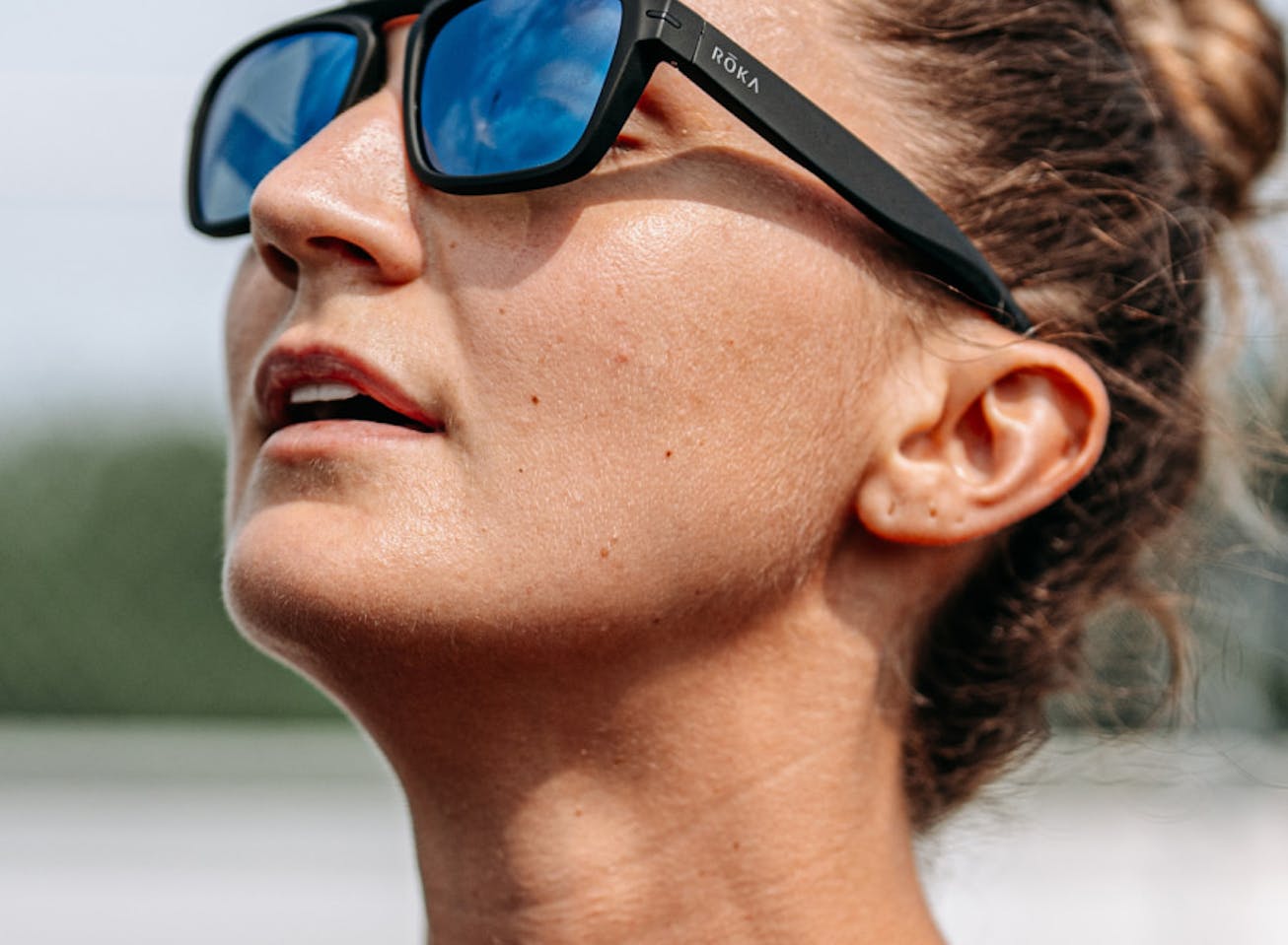 Woman looking up wearing Estacado sunglasses