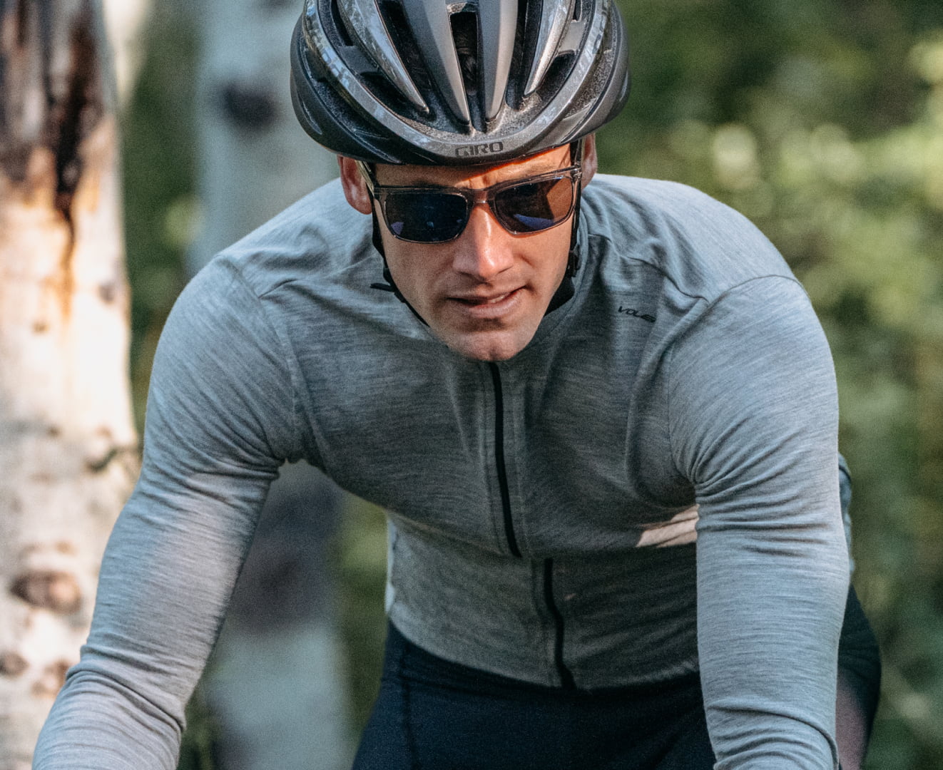 Man cycling wearing Barton sunglasses