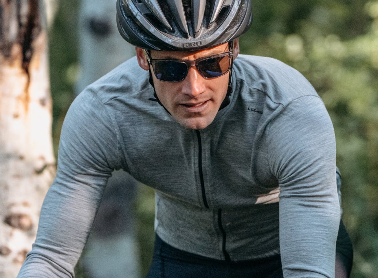 Man cycling wearing Barton sunglasses