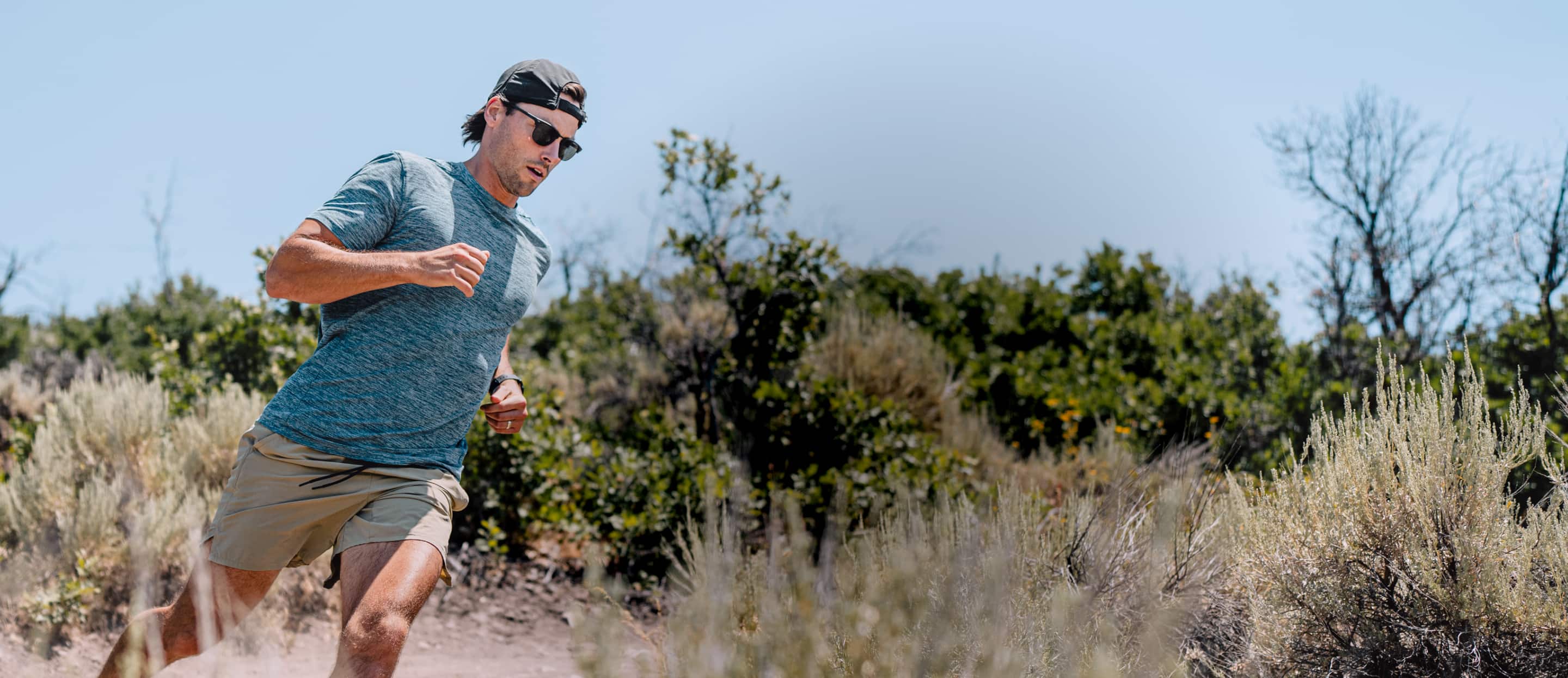 Man running outside wearing Cambridge sunglasses