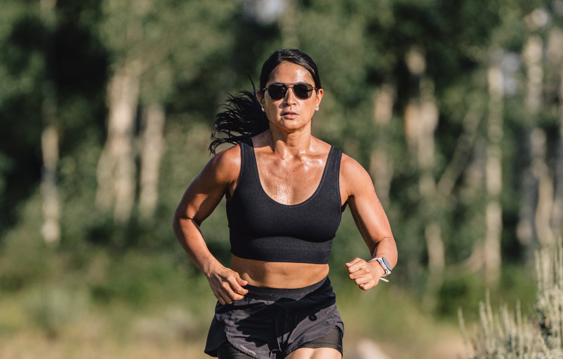 Woman running wearing Falcon sunglasses