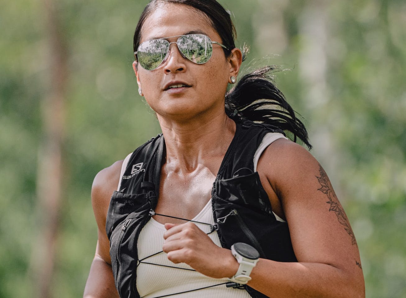 Woman running wearing Phantom sunglasses