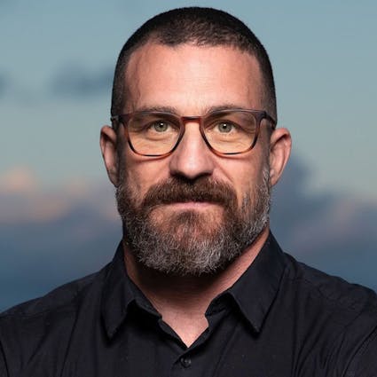 Dr. Andrew Huberman wearing ROKA eyeglasses.