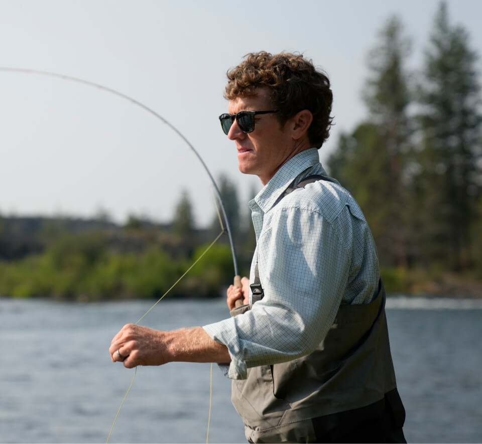 Man wading with fishing rod