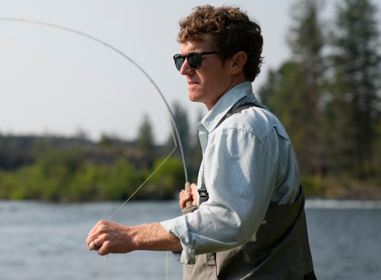 Man wading with fishing rod